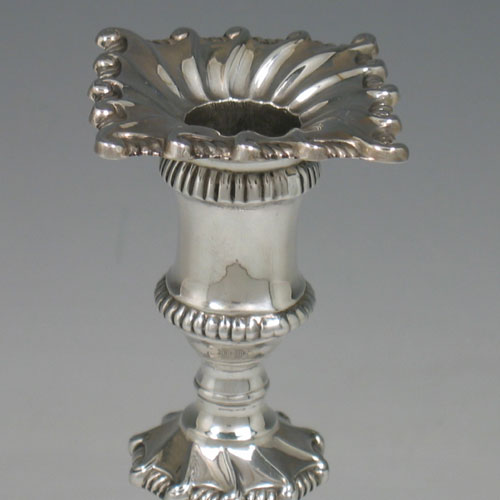 Sterling silver Edwardian taperstick made by Johnson, Walker, & Tolhusrt of London in 1909. Height 16 cms.