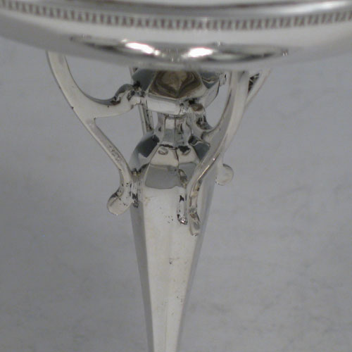 Sterling silver Art Nouveau tazza dish, having a round body with applied gadroon band and shaped border, sitting on a pedestal foot with four holding arms, and a base with gadroon border and four cast feet. Made by Pearce and Sons of Sheffield in 1918. The dimensions of this fine hand-made silver tazza dish are height 18 cms (7 inches), diameter 14 cms (5.5 inches), and it weighs approx. 292g (9.4 troy ounces).   