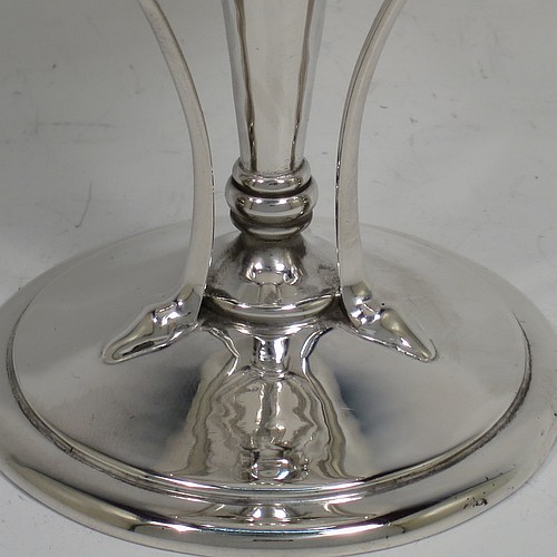 A very pretty Art Nouveau style Antique Edwardian Sterling Silver tazza dish or bowl, having a plain round bowl body with hand-hammered decoration, sitting on a pedestal foot with three scrolled side-handles. Made by James Dixon and Sons of Sheffield in 1905. The dimensions of this fine hand-made antique silver tazza bowl or dish are height 15 cms (6 inches), diameter of bowl 12 cms (4.75 inches), and it weighs approx. 272g (8.8 troy ounces).    