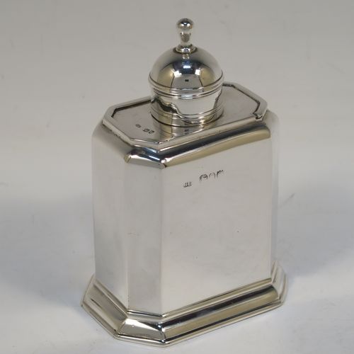 A very handsome Antique Victorian Sterling Silver  tea caddy box, in an early Queen Anne style, having a straight-sided octagonal body, a slide out cover with round pull-off lid and finial (that doubles as a measure), and sitting on an octagonal collet foot. This elegant antique silver tea caddy box was made by George Unite of London in 1891. The dimensions of this fine hand-made silver tea caddy box are height 11 cms (4.3 inches), length 8 cms (3 inches), width 6 cms (2.3 inches), and it weighs approx. 155g (5 troy ounces).  