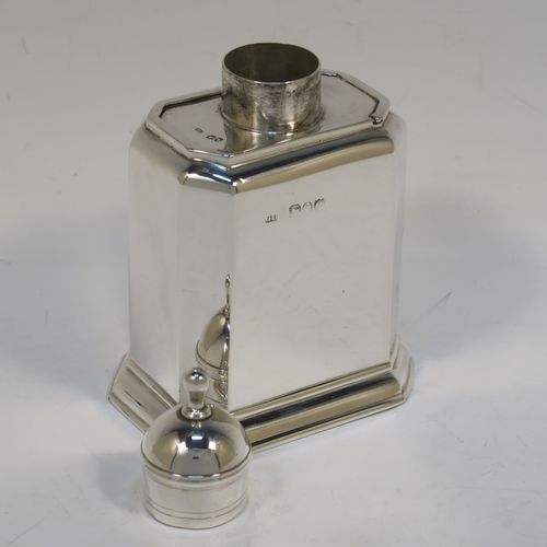 A very handsome Antique Victorian Sterling Silver  tea caddy box, in an early Queen Anne style, having a straight-sided octagonal body, a slide out cover with round pull-off lid and finial (that doubles as a measure), and sitting on an octagonal collet foot. This elegant antique silver tea caddy box was made by George Unite of London in 1891. The dimensions of this fine hand-made silver tea caddy box are height 11 cms (4.3 inches), length 8 cms (3 inches), width 6 cms (2.3 inches), and it weighs approx. 155g (5 troy ounces).  