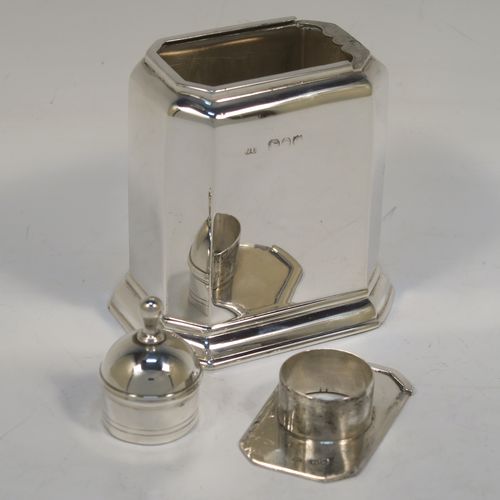 A very handsome Antique Victorian Sterling Silver  tea caddy box, in an early Queen Anne style, having a straight-sided octagonal body, a slide out cover with round pull-off lid and finial (that doubles as a measure), and sitting on an octagonal collet foot. This elegant antique silver tea caddy box was made by George Unite of London in 1891. The dimensions of this fine hand-made silver tea caddy box are height 11 cms (4.3 inches), length 8 cms (3 inches), width 6 cms (2.3 inches), and it weighs approx. 155g (5 troy ounces).  