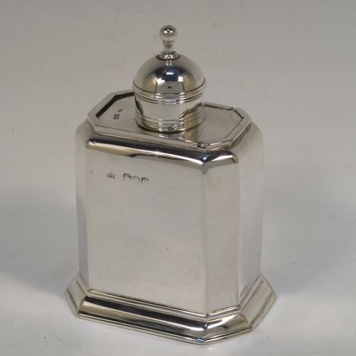 A very handsome Antique Victorian Sterling Silver  tea caddy box, in an early Queen Anne style, having a straight-sided octagonal body, a slide out cover with round pull-off lid and finial (that doubles as a measure), and sitting on an octagonal collet foot. This elegant antique silver tea caddy box was made by George Unite of London in 1891. The dimensions of this fine hand-made silver tea caddy box are height 11 cms (4.3 inches), length 8 cms (3 inches), width 6 cms (2.3 inches), and it weighs approx. 155g (5 troy ounces).  