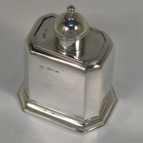 A very handsome Antique Victorian Sterling Silver  tea caddy box, in an early Queen Anne style, having a straight-sided octagonal body, a slide out cover with round pull-off lid and finial (that doubles as a measure), and sitting on an octagonal collet foot. This elegant antique silver tea caddy box was made by George Unite of London in 1891. The dimensions of this fine hand-made silver tea caddy box are height 11 cms (4.3 inches), length 8 cms (3 inches), width 6 cms (2.3 inches), and it weighs approx. 155g (5 troy ounces).  