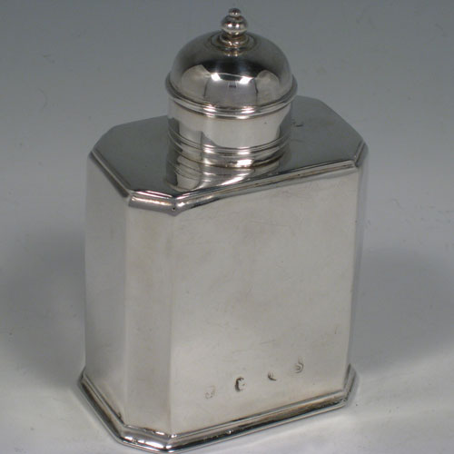 Antique Georgian Britannia standard silver tea caddy box, having a straight-sided octagonal body with readed edges, and a round pull-off lid with finial (that doubled as a measure). Made in the George I period by Gundry Roode (possibbly) and hallmarked for London in 1715. The dimensions of this fine hand-made silver tea caddy box are height 12 cms (4.75 inches), length 8 cms (3 inches), width 5.5 cms (2.25 inches), and it weighs approx. 175g (5.6 troy ounces).