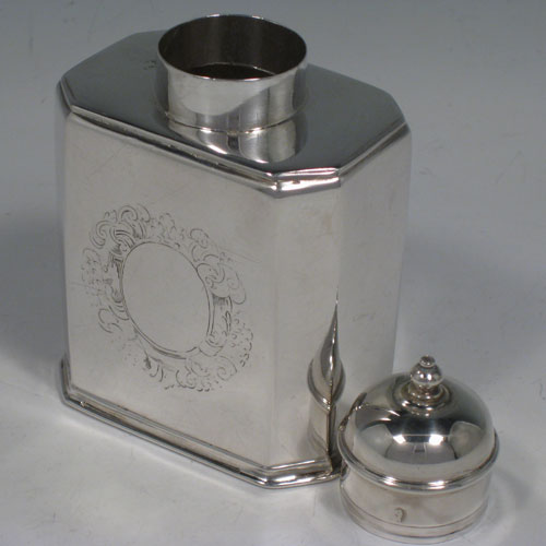 Antique Georgian Britannia standard silver tea caddy box, having a straight-sided octagonal body with readed edges, and a round pull-off lid with finial (that doubled as a measure). Made in the George I period by Gundry Roode (possibbly) and hallmarked for London in 1715. The dimensions of this fine hand-made silver tea caddy box are height 12 cms (4.75 inches), length 8 cms (3 inches), width 5.5 cms (2.25 inches), and it weighs approx. 175g (5.6 troy ounces).