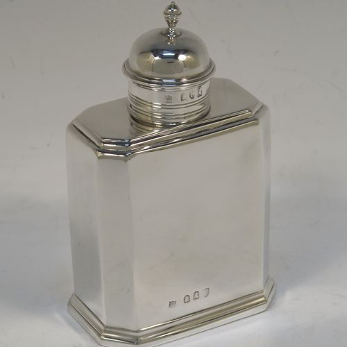 A very elegant Antique Victorian Britannia Standard silver tea caddy box in a Queen Anne or George I style, having a straight-sided octagonal body with reeded borders, and a round pull-off lid with finial (that doubles as a measure). This handsome antique silver tea caddy box was made by Thomas Bradbury of London in 1895. The dimensions of this fine hand-made antique silver tea caddy box are height 13 cms (5 inches), length 8 cms (3 inches), width 5 cms (2 inches), and it weighs approx. 173g (5.6 troy ounces).   