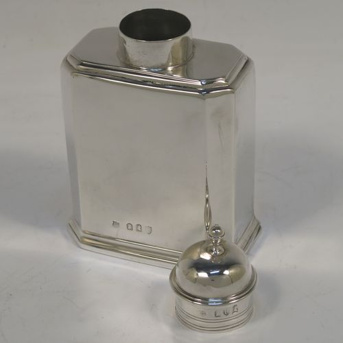 A very elegant Antique Victorian Britannia Standard silver tea caddy box in a Queen Anne or George I style, having a straight-sided octagonal body with reeded borders, and a round pull-off lid with finial (that doubles as a measure). This handsome antique silver tea caddy box was made by Thomas Bradbury of London in 1895. The dimensions of this fine hand-made antique silver tea caddy box are height 13 cms (5 inches), length 8 cms (3 inches), width 5 cms (2 inches), and it weighs approx. 173g (5.6 troy ounces).   