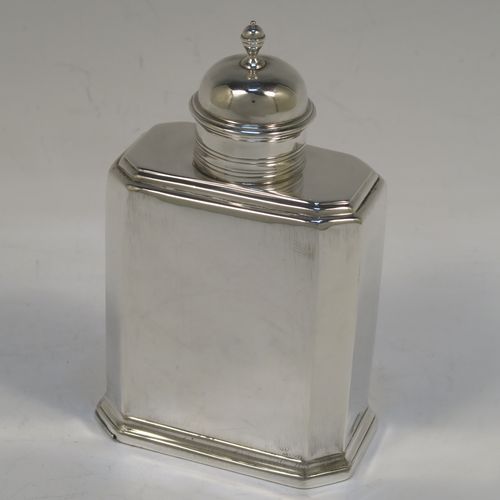 A very elegant Antique Victorian Britannia Standard silver tea caddy box in a Queen Anne or George I style, having a straight-sided octagonal body with reeded borders, and a round pull-off lid with finial (that doubles as a measure). This handsome antique silver tea caddy box was made by Thomas Bradbury of London in 1895. The dimensions of this fine hand-made antique silver tea caddy box are height 13 cms (5 inches), length 8 cms (3 inches), width 5 cms (2 inches), and it weighs approx. 173g (5.6 troy ounces).   