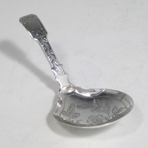 Antique Georgian sterling silver tea caddy spoon, having a hand-engraved handle, and an engraved round bowl, with floral decoration. Made by George Wintle of Birmingham in 1837. The dimensions of this fine hand-made silver tea caddy spoon are length 8.5 cms (3.3 inches), width 4 cms (1.5 inches), and it weighs approx. 11g (0.35 troy ounces).    