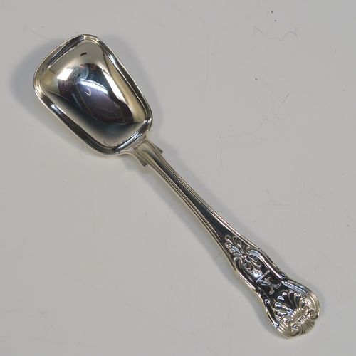 A large and handsome Antique Georgian Sterling Silver tea caddy spoon, having a double-struck Kings  pattern handle, and a plain shovel style bowl. This beautiful silver tea caddy spoon was made by William Eley of London in 1833. The dimensions of this fine hand-made antique silver tea caddy spoon are length 14 cms (5.5 inches), width across bowl 3.5 cms (1.3 inches), and it weighs approx. 14g (1 troy ounce).   