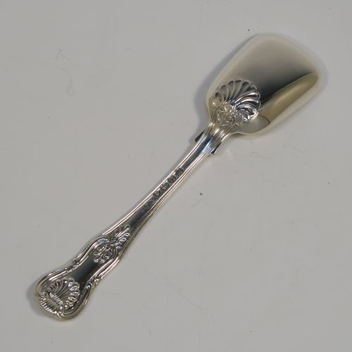 A large and handsome Antique Georgian Sterling Silver tea caddy spoon, having a double-struck Kings  pattern handle, and a plain shovel style bowl. This beautiful silver tea caddy spoon was made by William Eley of London in 1833. The dimensions of this fine hand-made antique silver tea caddy spoon are length 14 cms (5.5 inches), width across bowl 3.5 cms (1.3 inches), and it weighs approx. 14g (1 troy ounce).   