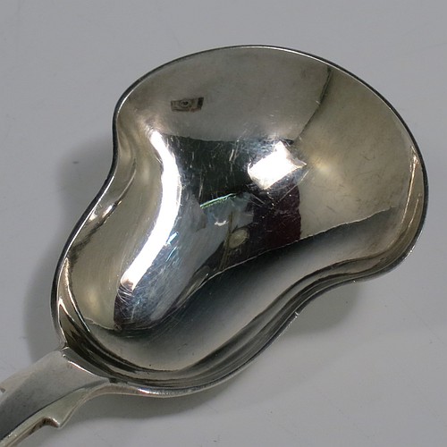 A large Antique early Victorian Sterling Silver tea caddy spoon, having a plain Fiddle pattern handle, and a pear-shaped plain oval bowl. Made by James Wintle of London in 1841. The dimensions of this fine hand-made antique silver tea caddy spoon are length 12.5 cms (5 inches), width across bowl 4 cms (1.5 inches), and it weighs approx. 25g (0.8 troy ounces). Please note that this item is monogrammed.   