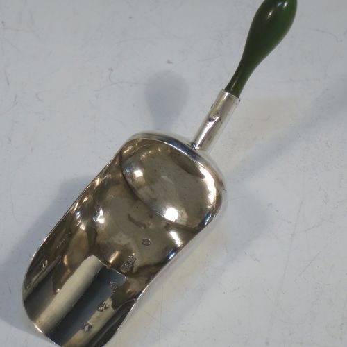 A rare and unusual Antique Georgian Sterling Silver tea caddy spoon, in a coal scuttle style with green stained bone handle. Made by Cocks and Bettridge of Birmingham in 1801. The dimensions of this fine hand-made antique silver tea caddy spoon are length 7 cms (2.75 inches), width 2 cms (0.75 inch), and it weighs approx. 7g (0.2 troy ounces).