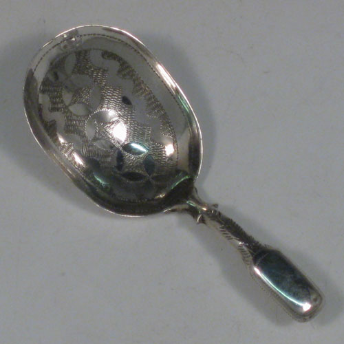 Antique Georgian sterling silver tea caddy spoon, having an engraved Fiddle pattern handle, and an engraved bowl, with a geometrical floral decoration. Made by Joseph Taylor of Birmingham in 1825. The dimensions of this fine hand-made silver tea caddy spoon are length 7.5 cms (3 inches), width 3 cms (1.2 inches), and it weighs approx. 6g (0.2 troy ounces).    