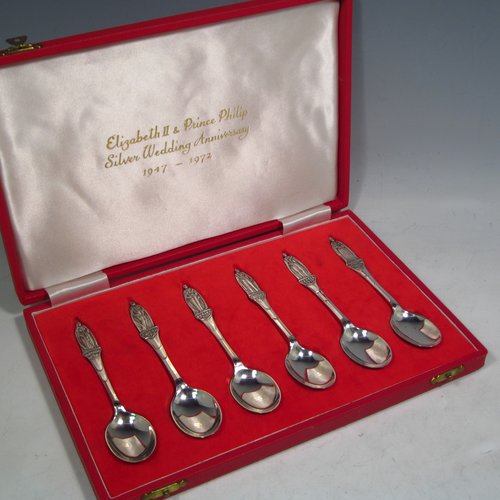 Sterling silver set of six commemorative coffee / tea spoons, having very plain oval bowls, with each spoon having a hand-chased figural terminal of a British Monarch, in original satin and velvet-lined presentation box, with an inscription for Elizabeth II & Prince Philips Silver Wedding Anniversary. Made by the Cooper Brothers of Sheffield in 1972. The dimensions of this fine hand-made set of silver tea / coffee spoons are length of each spoon 12 cms (4.75 inches), with a total weight of approx. 112g (3.6 troy ounces).