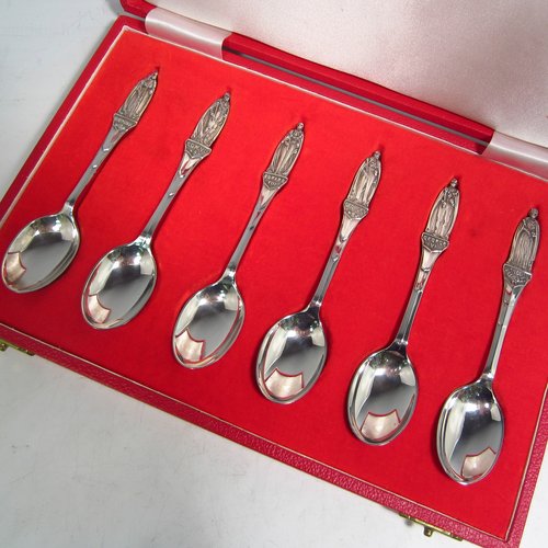 Sterling silver set of six commemorative coffee / tea spoons, having very plain oval bowls, with each spoon having a hand-chased figural terminal of a British Monarch, in original satin and velvet-lined presentation box, with an inscription for Elizabeth II & Prince Philips Silver Wedding Anniversary. Made by the Cooper Brothers of Sheffield in 1972. The dimensions of this fine hand-made set of silver tea / coffee spoons are length of each spoon 12 cms (4.75 inches), with a total weight of approx. 112g (3.6 troy ounces).