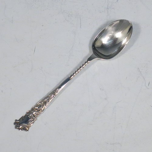 An Antique Edwardian Sterling Silver set of six tea or coffee spoons, having plain oval bowls, and handles with twisted stems and hand-chased ends with floral decoration, all in their original dark blue satin and velvet-lined presentation box. Made in Sheffield in 1904. The dimensions of this fine hand-made set of teaspoons or coffee spoons are length of each spoon 11 cms (4.25 inches), and the total weight is approx. 90g (3 troy ounces).   