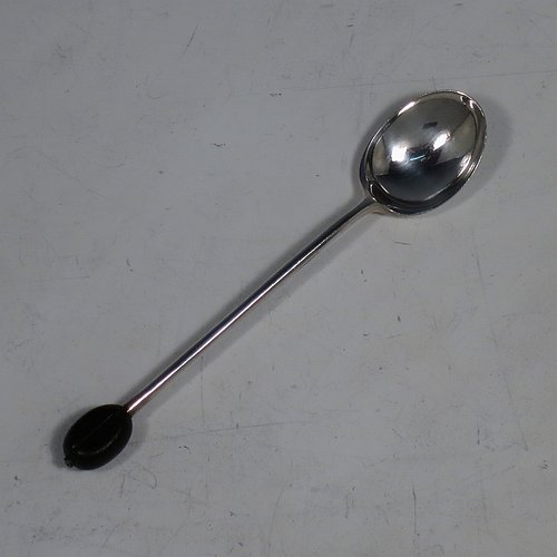 A Sterling Silver set of six tea or coffee spoons, having plain oval bowls, and handles with black coffee bean ends, all in their original cream satin and velvet-lined presentation box. Made by Mappin & Webb of Sheffield in 1925. The dimensions of this fine hand-made set of teaspoons or coffee spoons are length of each spoon 10 cms (4 inches), and the total weight is approx. 50g (1.5 troy ounces). Please note that the satin band covering the internal hinge is damaged.    