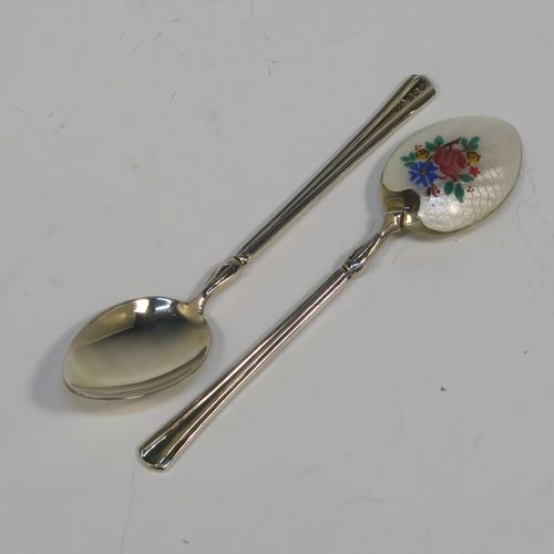 An extremely pretty Antique Sterling Silver and enamelled set of six tea or coffee spoons, having hand-painted and enamelled spoon backs in a floral design, all in their original cream satin and velvet-line presentation box. These beautiful antique silver and enamelled spoons were made by Turner and Simpson of Birmingham in 1915. The dimensions of this fine hand-made set of silver and enamelled teaspoons or coffee spoons are length of each spoon 10 cms (4 inches), and the total weight is approx. 66g (2.1 troy ounces). Please note that the enamel is in perfect order which is rare to find in spoons of this age.  