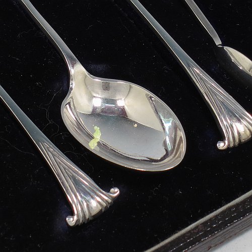 An Antique Victorian Sterling Silver set of six teaspoons and a pair of sugar nips in the Onslow pattern, having plain oval bowls, all in their original light blue satin and dark blue velvet-lined presentation box. Made by William Hutton of London in 1894. The dimensions of this fine hand-made antique set of teaspoons are length of each spoon 11 cms (4.25 inches), and the total weight is approx. 80g (2.6 troy ounces).   