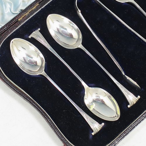 An Antique Victorian Sterling Silver set of six teaspoons and a pair of sugar nips in the Onslow pattern, having plain oval bowls, all in their original light blue satin and dark blue velvet-lined presentation box. Made by William Hutton of London in 1894. The dimensions of this fine hand-made antique set of teaspoons are length of each spoon 11 cms (4.25 inches), and the total weight is approx. 80g (2.6 troy ounces).   