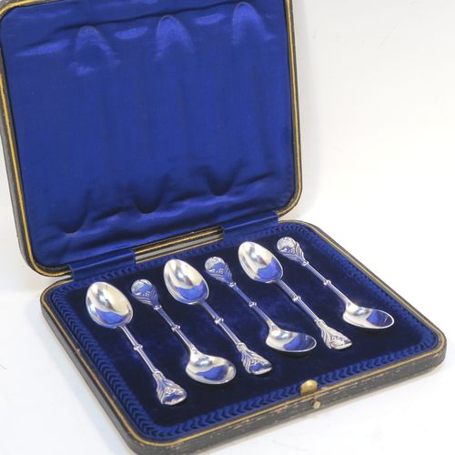 A very pretty Antique Edwardian Sterling Silver set of six tea or coffee spoons, in an Art Nouveau style with hand-chased floral decoration, and having plain oval bowls, all in their original dark blue satin and velvet-lined presentation box. These beautiful antique silver spoons were made by Joseph Rogers of Sheffield in 1907. The dimensions of this fine hand-made set of silver teaspoons or coffee spoons are length of each spoon 11 cms (4.25 inches), and the total weight is approx. 88g (2.8 troy ounces).   