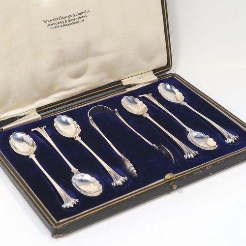 A very pretty Antique Victorian Sterling Silver set of six teaspoons and sugar nips in the Onslow pattern, having unusual oval bowls with lobed decoration and fluting on the reverse, all in their original cream satin and dark blue velvet-lined presentation box. These beautiful silver teaspoons and sugar nips were made by Charles Stuart Harris of London in 1894. The dimensions of this fine hand-made set of teaspoons are length of each spoon 11 cms (4.25 inches), and the total weight is approx. 93g (3 troy ounce).  