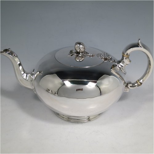 An Antique Victorian Sterling Silver three-piece  tea set, consisting of a teapot, sugar bowl and cream jug. The bodies in a plain round style with scroll handles, the teapot with silver handle and finial, and all sitting on collet feet. Made by the Barnard Brothers of London in 1847. The dimensions of this fine hand-made antique silver tea service are length of teapot 26 cms (10.25 inches), height 13.5 cms (5.25 inches), and it weighs a total of approx. 1,101g (35.5 troy ounces).   