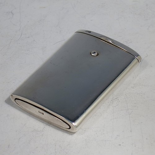 A Sterling Silver Vesta match case, having a plain rectangular shaped body, with pull-out match holder, and a strike plate on one end. Made by Lindsay & Paisley Ltd., of Birmingham in 1925. The dimensions of this fine hand-made silver Vesta case are length 6 cms (2.3 inches), width 4 cms (1.5 inches), and it weighs approx. 40g (1.3 troy ounce). Please note that this item has a presentation inscription inside.