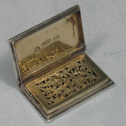 Antique Georgian sterling silver and gold-gilt 'book-form' vinaigrette. Made by Taylor & Perry of Birmingham in 1833. Length 3.5 cms.