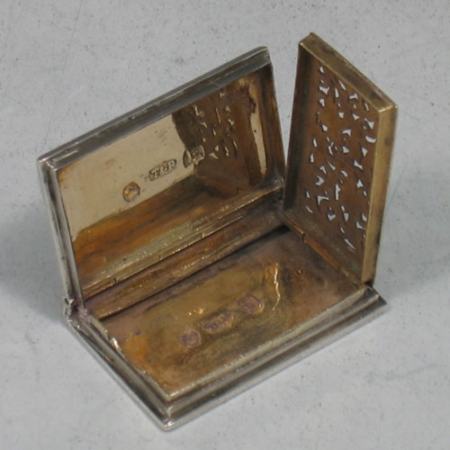 Antique Georgian sterling silver and gold-gilt 'book-form' vinaigrette. Made by Taylor & Perry of Birmingham in 1833. Length 3.5 cms.