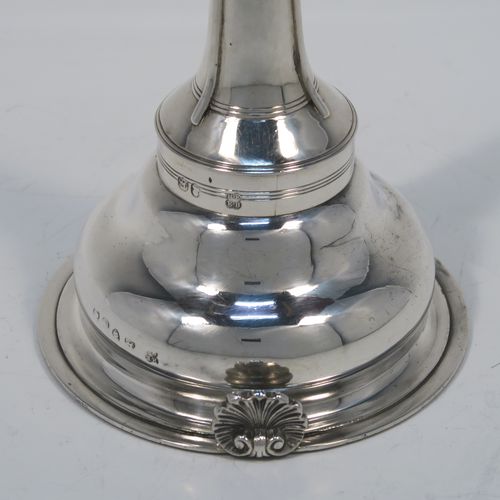 A very elegant Antique Georgian Sterling Silver wine decanting funnel, having a plain round body with applied reeded borders and a cast shell style side clip, an original muslin ring, and original removable funnel with side aeration struts. This handsome silver wine funnel was made by Emes and Barnard of London in 1819. The dimensions of this fine hand-made antique silver wine decanting funnel are height 13.5 cms (5.3 inches), diameter of bowl 9 cms (3.5 inches), and it weighs approx. 98g (3.2 troy ounces).   