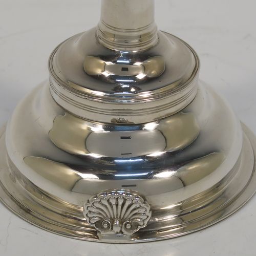 A very handsome Antique Georgian Sterling Silver wine decanting funnel, having a plain round body with an applied double feather-edged border and a cast shell style side clip, and original removable funnel. This elegant antique silver wine funnel was made in London in 1819. The dimensions of this fine hand-made antique silver wine decanting funnel are height 13 cms (5 inches), diameter of bowl 9.5 cms (3.75 inches), and it weighs approx. 102g (3.3 troy ounces).   